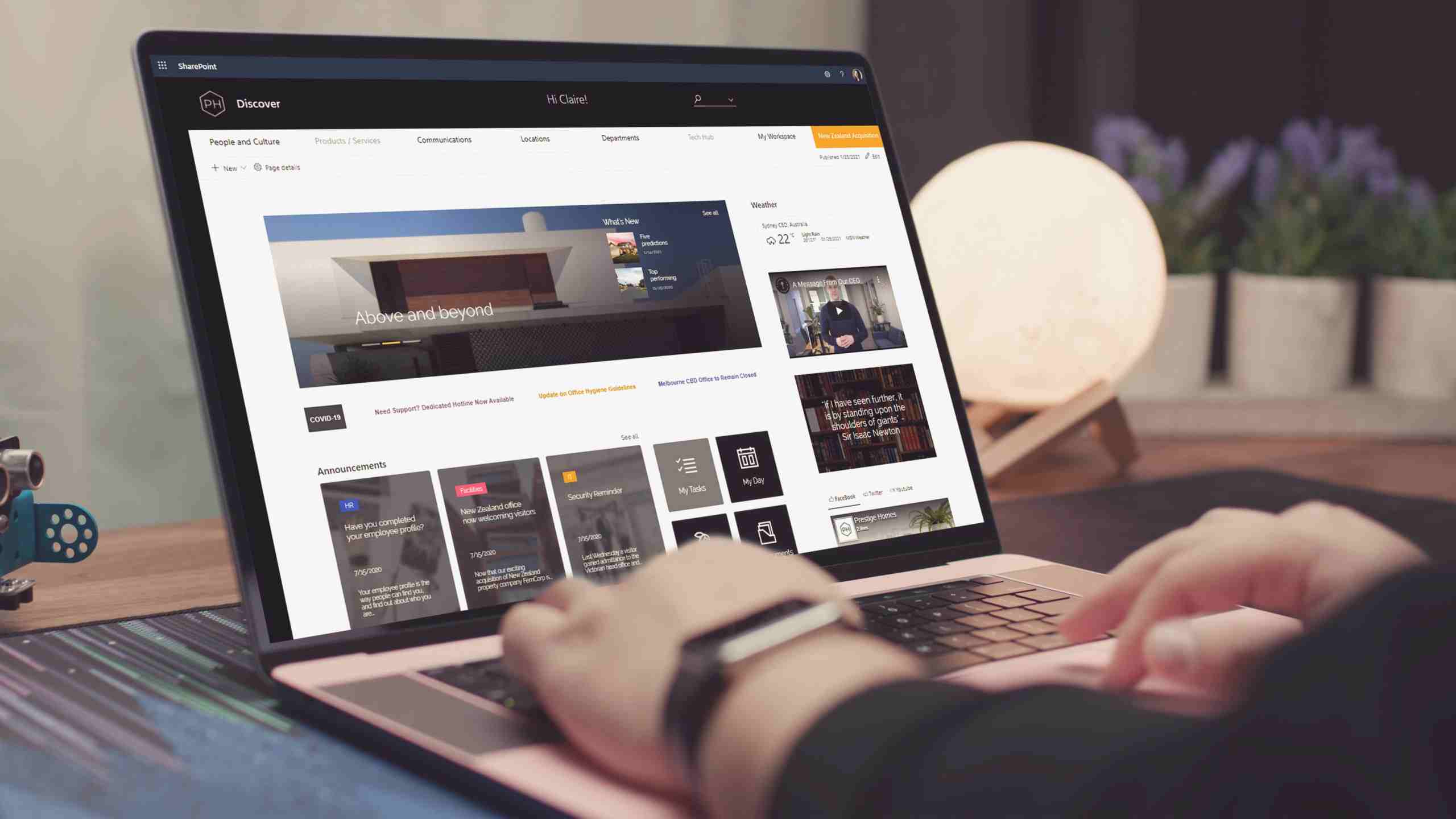 Injio SharePoint Intranet homepage on laptop